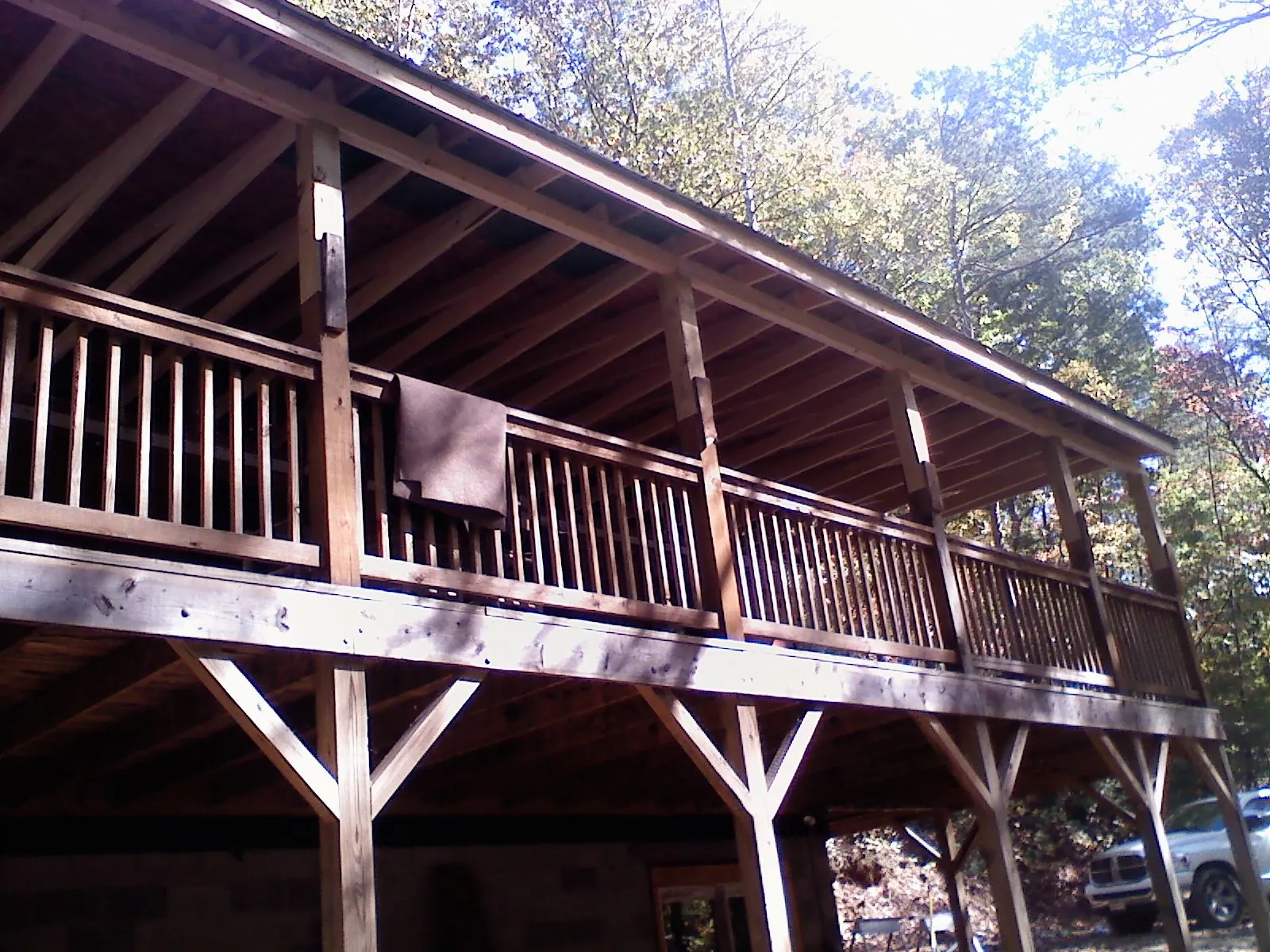 Timber framing under a new elevated porch and deck — Roof Leak Repair in Roxbury by Roofing Brothers